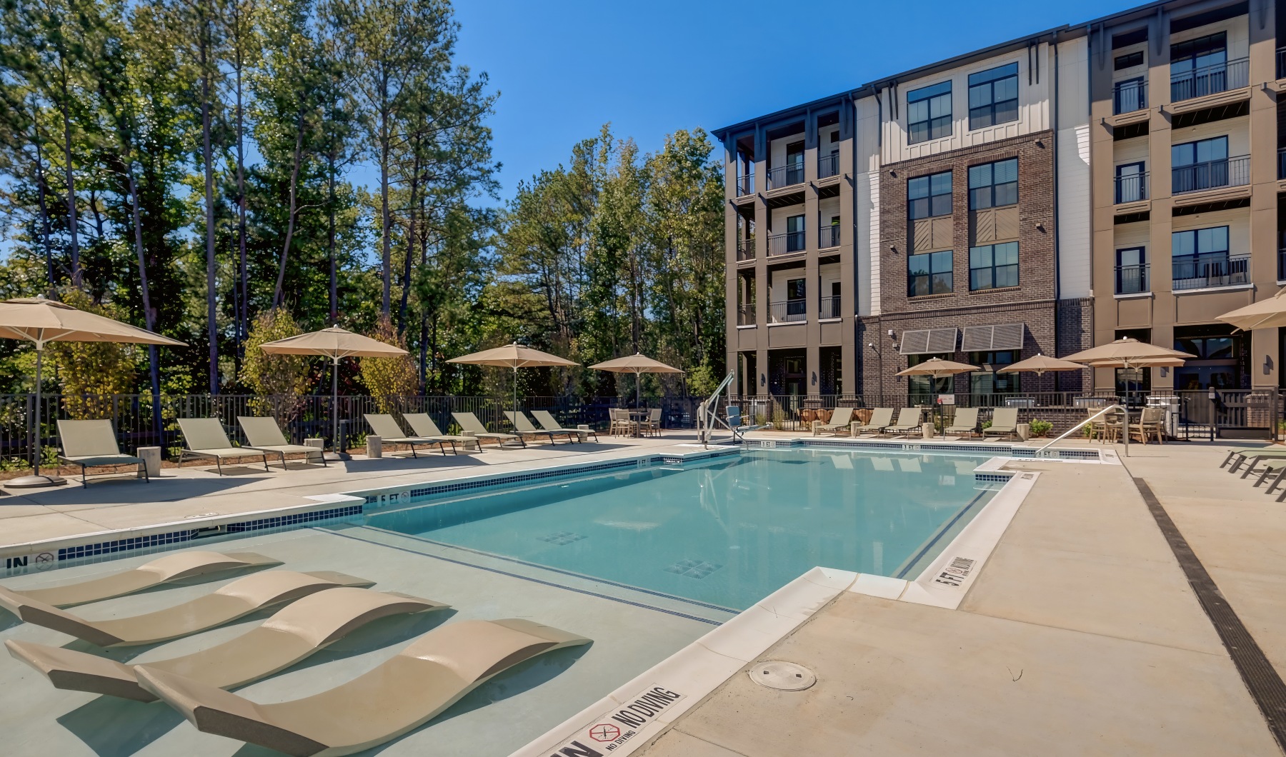 Community pool with loungers